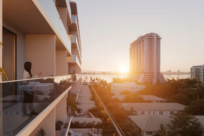 The VIDA exterior and Edgewater skyline at dusk